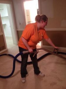 Water damage Holt Technician vacuuming up water